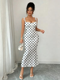 Black Polka Dot Fishtail Dress on White Background, with Double Shoulder Bow Ties + Chest Ruching for Strong Waist Shaping, Slim Fit, Hip-Hugging, Mid-Length Dress