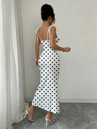 Black Polka Dot Fishtail Dress on White Background, with Double Shoulder Bow Ties + Chest Ruching for Strong Waist Shaping, Slim Fit, Hip-Hugging, Mid-Length Dress