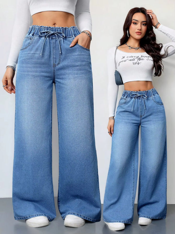 Jean large taille haute élastique, effet délavé